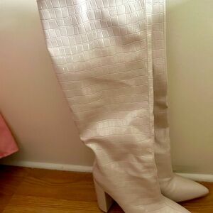 Cream knee high boots